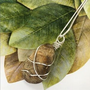 𝅺WIRE wrap pendant on 9.25 sterling silver chain.